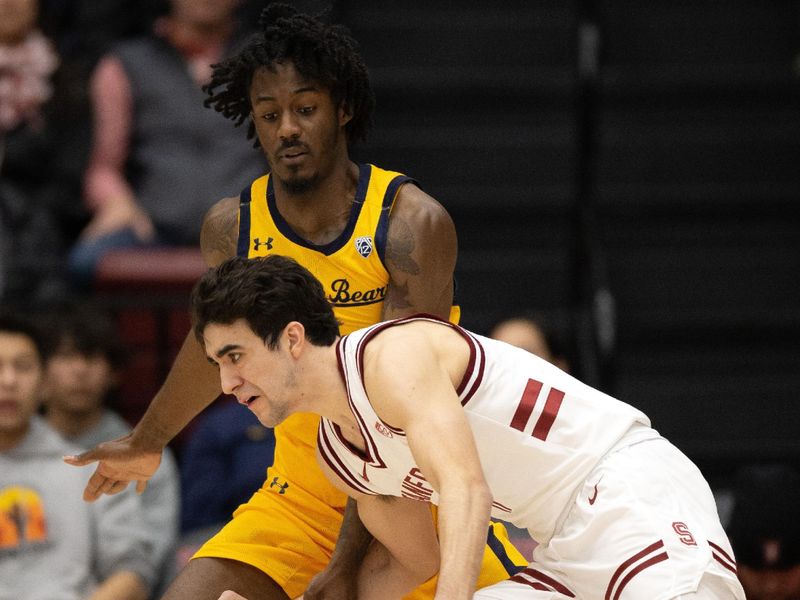 Jan 28, 2023; Stanford, California, USA; Stanford Cardinal guard Isa Silva (in white) drives around California Golden Bears guard Joel Brown during the first half at Maples Pavilion. Mandatory Credit: D. Ross Cameron-USA TODAY Sports