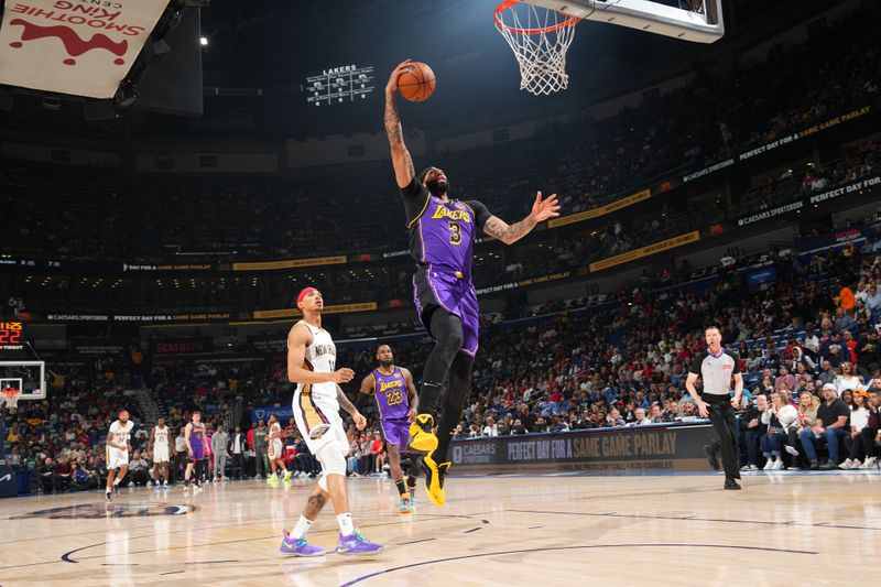 NEW ORLEANS, LA - NOVEMBER 16: Anthony Davis #3 of the Los Angeles Lakers drives to the basket during the game against the New Orleans Pelicans on November 16, 2024 at the Smoothie King Center in New Orleans, Louisiana. NOTE TO USER: User expressly acknowledges and agrees that, by downloading and or using this Photograph, user is consenting to the terms and conditions of the Getty Images License Agreement. Mandatory Copyright Notice: Copyright 2024 NBAE (Photo by Jesse D. Garrabrant/NBAE via Getty Images)