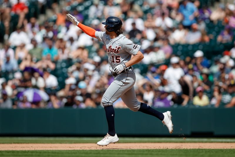 Jul 2, 2023; Denver, Colorado, USA; Detroit Tigers center fielder Jake Marisnick (15) gestures as he rounds the bases on a grand slam in the eighth inning against the Colorado Rockies at Coors Field. Mandatory Credit: Isaiah J. Downing-USA TODAY Sports