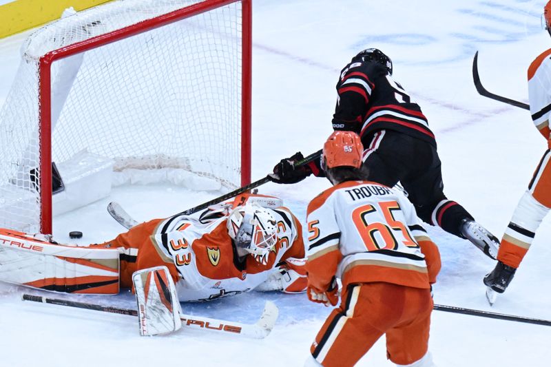 Nov 30, 2025; Chicago, Illinois, USA;  Chicago Blackhawks center Connor Bedard (98) scores a goal past. Anaheim Ducks goaltender Ville Husso during the third period at United Center. Mandatory Credit: Matt Marton-Imagn Images