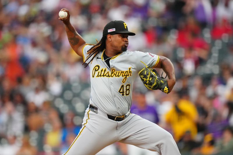 Jun 14, 2024; Denver, Colorado, USA; Pittsburgh Pirates relief pitcher Luis L. Ortiz (48) delvers a pitch in the sixth inning against the Colorado Rockies at Coors Field. Mandatory Credit: Ron Chenoy-USA TODAY Sports