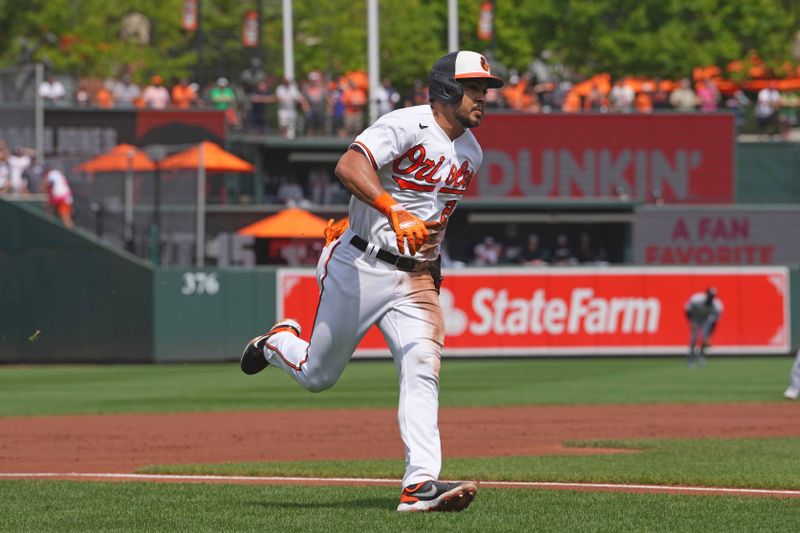 Aug 30, 2023; Baltimore, Maryland, USA; Baltimore Orioles outfielder Anthony Santander (25) rounds the bases to score in the first inning against the Chicago White Sox at Oriole Park at Camden Yards. Mandatory Credit: Mitch Stringer-USA TODAY Sports