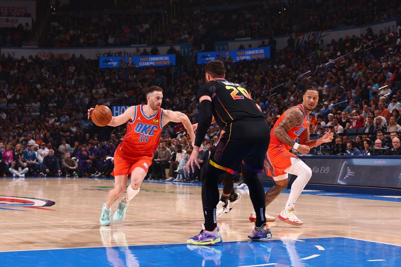 OKLAHOMA CITY, OK - MARCH 29: Gordon Hayward #33 of the Oklahoma City Thunder handles the ball during the game against the Phoenix Suns on March 29, 2024 at Paycom Arena in Oklahoma City, Oklahoma. NOTE TO USER: User expressly acknowledges and agrees that, by downloading and or using this photograph, User is consenting to the terms and conditions of the Getty Images License Agreement. Mandatory Copyright Notice: Copyright 2024 NBAE (Photo by Zach Beeker/NBAE via Getty Images)