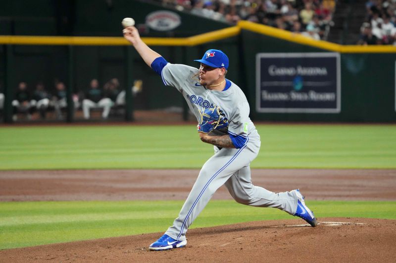 Jul 12, 2024; Phoenix, Arizona, USA; Toronto Blue Jays shortstop Leo Jiménez (49) pitches against the Arizona Diamondbacks during the first inning at Chase Field. Mandatory Credit: Joe Camporeale-USA TODAY Sports