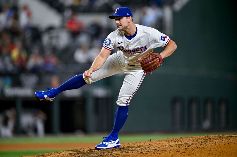 Sep 5, 2024; Arlington, Texas, USA; Texas Rangers relief pitcher David Robertson (37) pitches against the Los Angeles Angels during the game at Globe Life Field. Mandatory Credit: Jerome Miron-Imagn Images