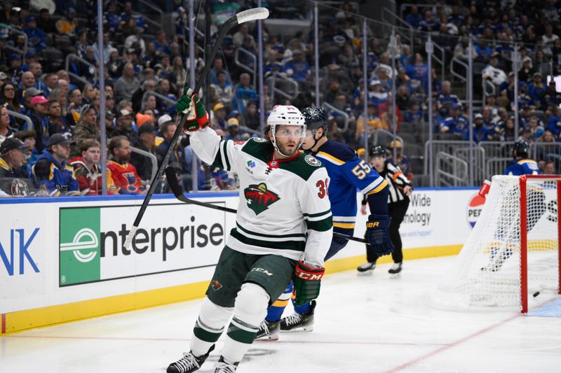 Oct 15, 2024; St. Louis, Missouri, USA; Minnesota Wild right wing Ryan Hartman (38) reacts after scoring a goal against the St. Louis Blues during the first period at Enterprise Center. Mandatory Credit: Jeff Le-Imagn Images