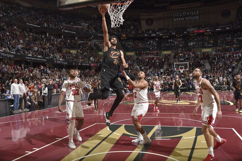 CLEVELAND, OH - November 15: Jarrett Allen #31 of the Cleveland Cavaliers drives to the basket during the game against the Chicago Bulls during the Emirates NBA Cup game on November 15, 2024 at Rocket Mortgage FieldHouse in Cleveland, Ohio. NOTE TO USER: User expressly acknowledges and agrees that, by downloading and/or using this Photograph, user is consenting to the terms and conditions of the Getty Images License Agreement. Mandatory Copyright Notice: Copyright 2024 NBAE (Photo by David Liam Kyle/NBAE via Getty Images)