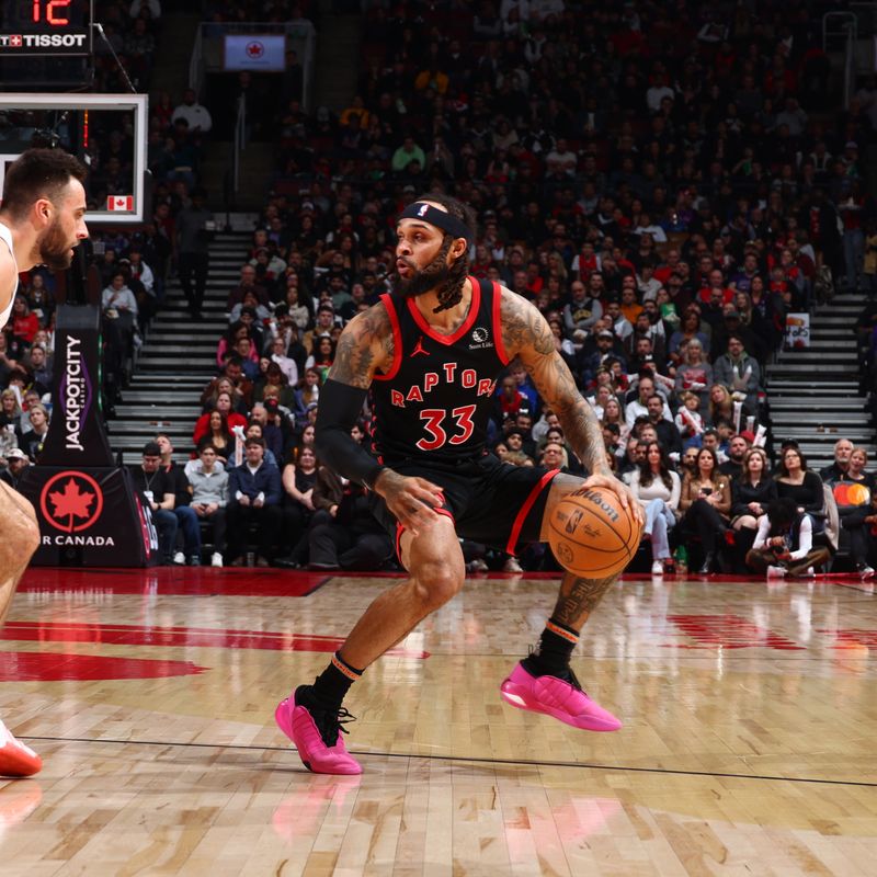 TORONTO, CANADA - FEBRUARY 10: Gary Trent Jr. #33 of the Toronto Raptors dribbles the ball during the game against the Cleveland Cavaliers on February 10, 2024 at the Scotiabank Arena in Toronto, Ontario, Canada.  NOTE TO USER: User expressly acknowledges and agrees that, by downloading and or using this Photograph, user is consenting to the terms and conditions of the Getty Images License Agreement.  Mandatory Copyright Notice: Copyright 2024 NBAE (Photo by Vaughn Ridley/NBAE via Getty Images)