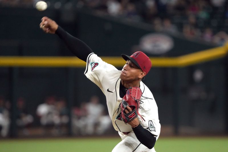 Jul 8, 2024; Phoenix, Arizona, USA; Arizona Diamondbacks pitcher Yilber Diaz (45) throws against the Atlanta Braves in the first inning at Chase Field. Mandatory Credit: Rick Scuteri-USA TODAY Sports