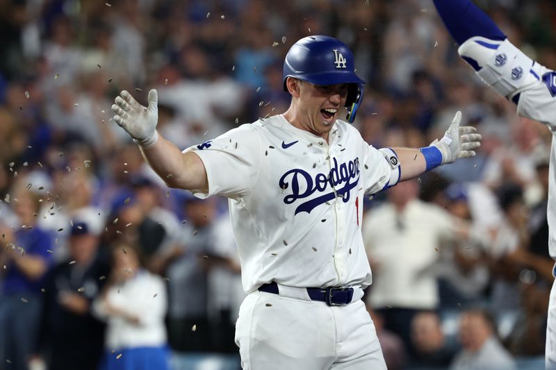 Jul 5, 2024; Los Angeles, California, USA;  Los Angeles Dodgers catcher Will Smith (16) reacts after hitting a third home run of the game during the seventh inning against the Milwaukee Brewers at Dodger Stadium. Mandatory Credit: Kiyoshi Mio-USA TODAY Sports