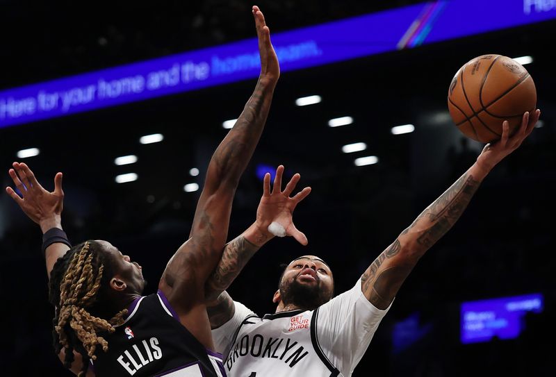 NEW YORK, NEW YORK - JANUARY 27: Keon Ellis #23 of the Sacramento Kings guards D'Angelo Russell #1 of the Brooklyn Nets as he goes to the basket during the first half at Barclays Center on January 27, 2025 in the Brooklyn borough of New York City. NOTE TO USER: User expressly acknowledges and agrees that, by downloading and or using this photograph, User is consenting to the terms and conditions of the Getty Images License Agreement. (Photo by Sarah Stier/Getty Images)