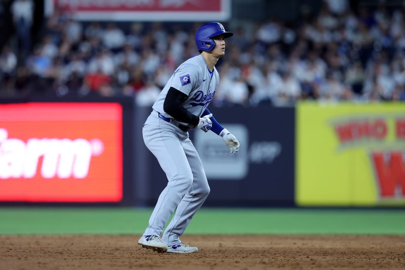 Jun 7, 2024; Bronx, New York, USA; Los Angeles Dodgers designated hitter Shohei Ohtani (17) leads off second base during the eleventh inning against the New York Yankees at Yankee Stadium. Mandatory Credit: Brad Penner-USA TODAY Sports