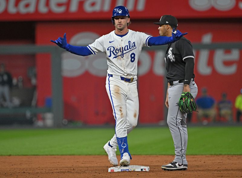 May 5, 2025; Kansas City, Missouri, USA;  Kansas City Royals right fielder Drew Waters (8) reacts after driving in a run with a double in the eighth inning against the Chicago White Sox at Kauffman Stadium. Mandatory Credit: Peter Aiken-Imagn Images