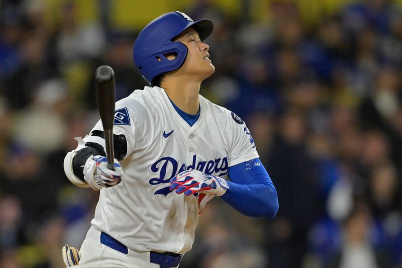 Apr 25, 2025; Los Angeles, California, USA;  Los Angeles Dodgers designated hitter Shohei Ohtani (17) flies out in the eighth inning against the Pittsburgh Pirates at Dodger Stadium. Mandatory Credit: Jayne Kamin-Oncea-Imagn Images