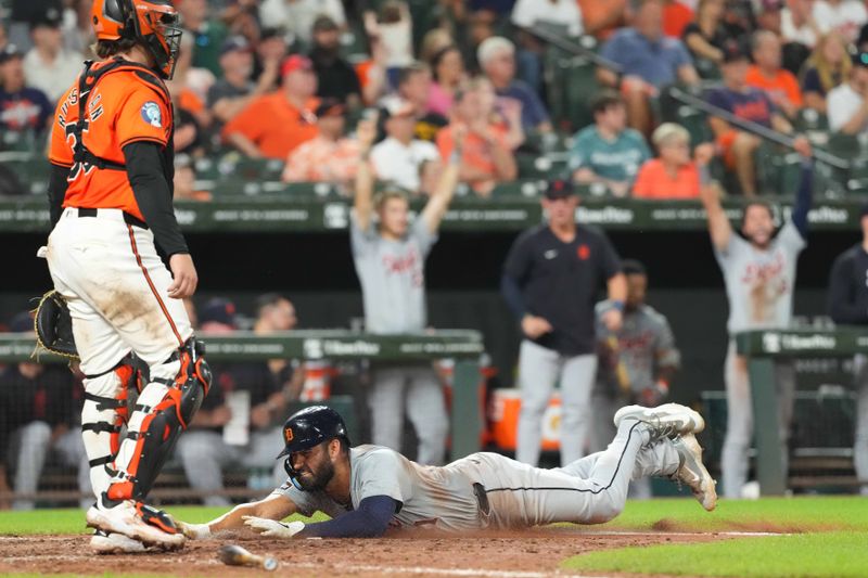 Sep 21, 2024; Baltimore, Maryland, USA; Detroit Tigers outfielder Riley Greene (31) scores during the tenth inning against the Baltimore Orioles at Oriole Park at Camden Yards. Mandatory Credit: Mitch Stringer-Imagn Images