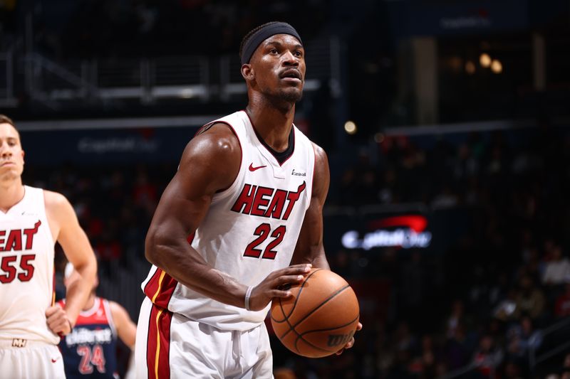 WASHINGTON, DC -? MARCH 31:  Jimmy Butler #22 of the Miami Heat shoots a free throw during the game against the Washington Wizards on March 31, 2024 at Capital One Arena in Washington, DC. NOTE TO USER: User expressly acknowledges and agrees that, by downloading and or using this Photograph, user is consenting to the terms and conditions of the Getty Images License Agreement. Mandatory Copyright Notice: Copyright 2024 NBAE (Photo by Kenny Giarla/NBAE via Getty Images)