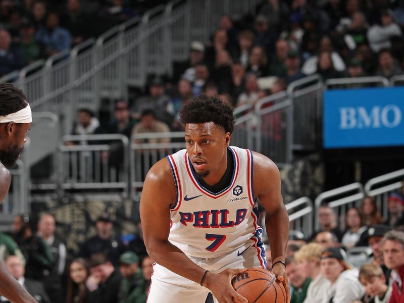 MILWAUKEE, WI - MARCH 14: Kyle Lowry of the Philadelphia 76ers looks on during the game against the Milwaukee Bucks on March 14, 2024 at the Fiserv Forum Center in Milwaukee, Wisconsin. NOTE TO USER: User expressly acknowledges and agrees that, by downloading and or using this Photograph, user is consenting to the terms and conditions of the Getty Images License Agreement. Mandatory Copyright Notice: Copyright 2024 NBAE (Photo by Gary Dineen/NBAE via Getty Images).