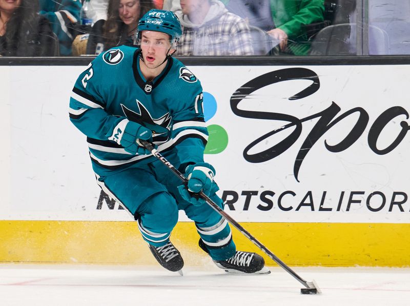 Apr 6, 2024; San Jose, California, USA; San Jose Sharks left wing William Eklund (72) plays the puck against the St. Louis Blues during the second period at SAP Center at San Jose. Mandatory Credit: Robert Edwards-USA TODAY Sports