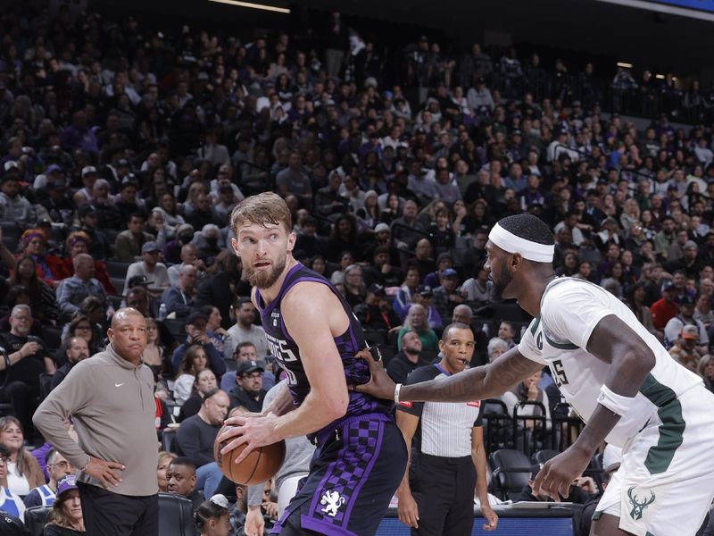 SACRAMENTO, CA - MARCH 12: Domantas Sabonis #10 of the Sacramento Kings handles the ball during the game against the Milwaukee Bucks on March 12, 2024 at Golden 1 Center in Sacramento, California. NOTE TO USER: User expressly acknowledges and agrees that, by downloading and or using this Photograph, user is consenting to the terms and conditions of the Getty Images License Agreement. Mandatory Copyright Notice: Copyright 2024 NBAE (Photo by Rocky Widner/NBAE via Getty Images)