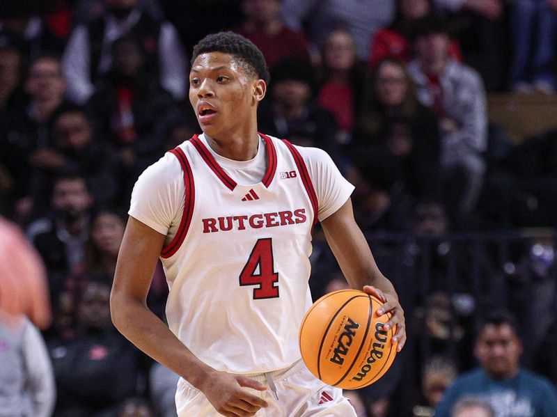 Feb 1, 2025; Piscataway, New Jersey, USA; Rutgers Scarlet Knights guard Ace Bailey (4) dribbles up court during the second half against the Michigan Wolverines at Jersey Mike's Arena. Mandatory Credit: Vincent Carchietta-Imagn Images