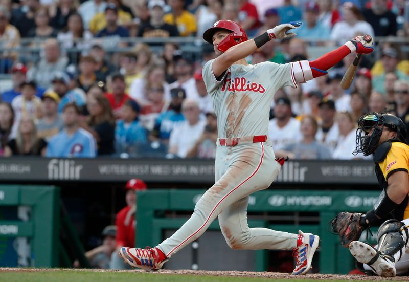 Jul 19, 2024; Pittsburgh, Pennsylvania, USA;  Philadelphia Phillies shortstop Trea Turner (7) hits a two run home run against the Pittsburgh Pirates during the fourth inning at PNC Park. Mandatory Credit: Charles LeClaire-USA TODAY Sports