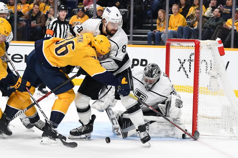 Jan 31, 2024; Nashville, Tennessee, USA; Los Angeles Kings defenseman Drew Doughty (8) is called for interference against Nashville Predators left wing Cole Smith (36) as he defends in front of goaltender David Rittich (31) during the third period at Bridgestone Arena. Mandatory Credit: Christopher Hanewinckel-USA TODAY Sports