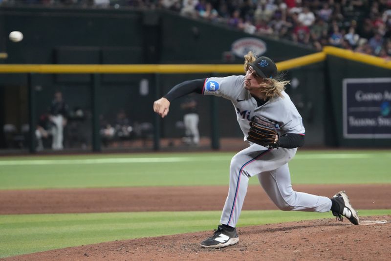 Jun 29, 2025; Phoenix, Arizona, USA; Miami Marlins pitcher Lake Bachar (84) pitches against the Arizona Diamondbacks during the sixth inning at Chase Field. Mandatory Credit: Joe Camporeale-Imagn Images