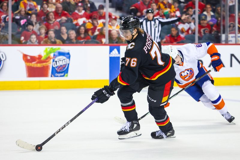 Nov 18, 2023; Calgary, Alberta, CAN; Calgary Flames center Martin Pospisil (76) controls the puck against the New York Islanders during the overtime period at Scotiabank Saddledome. Mandatory Credit: Sergei Belski-USA TODAY Sports