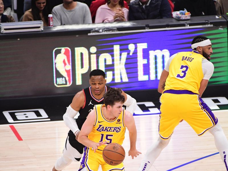 LOS ANGELES, CA - FEBRUARY 28:  Austin Reaves #15 of the Los Angeles Lakers goes to the basket during the game on February 28, 2024 at Crypto.Com Arena in Los Angeles, California. NOTE TO USER: User expressly acknowledges and agrees that, by downloading and/or using this Photograph, user is consenting to the terms and conditions of the Getty Images License Agreement. Mandatory Copyright Notice: Copyright 2024 NBAE (Photo by Adam Pantozzi/NBAE via Getty Images)