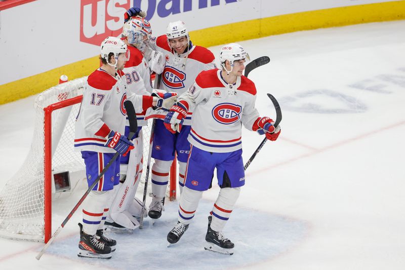 Dec 22, 2023; Chicago, Illinois, USA; Montreal Canadiens goaltender Cayden Primeau (30) celebrates with teammates after defeating the Chicago Blackhawks at United Center. Mandatory Credit: Kamil Krzaczynski-USA TODAY Sports