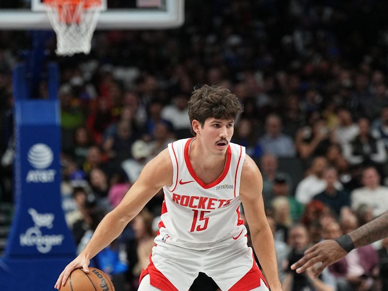 DALLAS, TX - OCTOBER 31: Reed Sheppard #15 of the Houston Rockets dribbles the ball during the game against the Dallas Mavericks on October 31, 2024 at American Airlines Center in Dallas, Texas. NOTE TO USER: User expressly acknowledges and agrees that, by downloading and or using this photograph, User is consenting to the terms and conditions of the Getty Images License Agreement. Mandatory Copyright Notice: Copyright 2024 NBAE (Photo by Glenn James/NBAE via Getty Images)