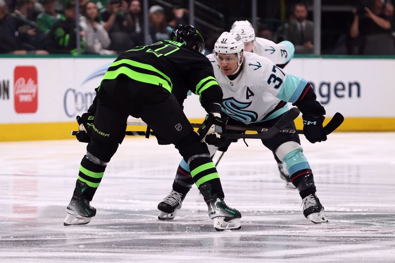 Apr 13, 2024; Dallas, Texas, USA; Seattle Kraken center Yanni Gourde (37) and Dallas Stars center Tyler Seguin (91) wait for the opening face off in the first period at American Airlines Center. Mandatory Credit: Tim Heitman-USA TODAY Sports