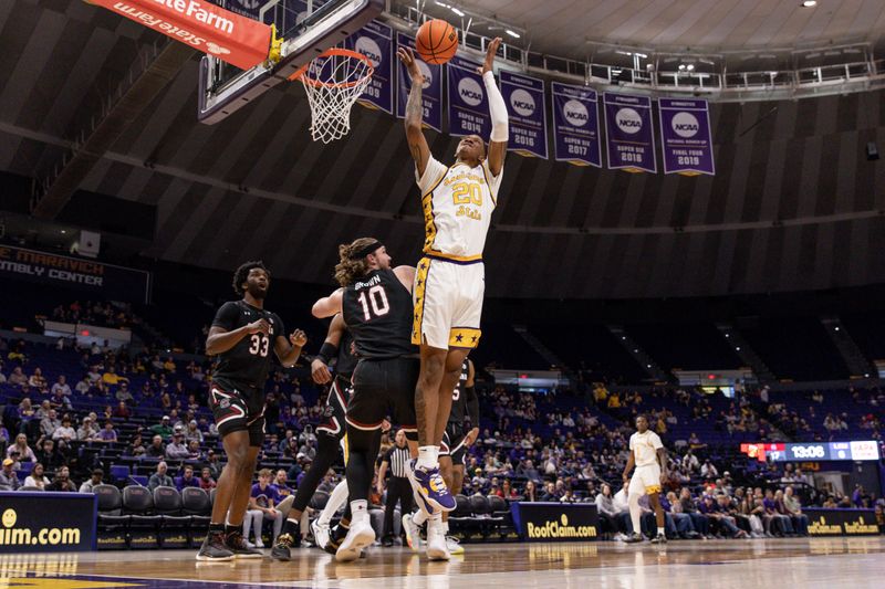 Feb 18, 2023; Baton Rouge, Louisiana, USA; LSU Tigers forward Derek Fountain (20) grabs a rebound against South Carolina Gamecocks forward Hayden Brown (10) at Pete Maravich Assembly Center. Mandatory Credit: Stephen Lew-USA TODAY Sports