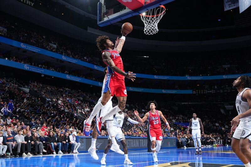 PHILADELPHIA, PA - NOVEMBER 22: Kelly Oubre Jr. #9 of the Philadelphia 76ers drives to the basket during the game against the Brooklyn Nets during the Emirates NBA Cup game on November 22, 2024 at the Wells Fargo Center in Philadelphia, Pennsylvania NOTE TO USER: User expressly acknowledges and agrees that, by downloading and/or using this Photograph, user is consenting to the terms and conditions of the Getty Images License Agreement. Mandatory Copyright Notice: Copyright 2024 NBAE (Photo by Jesse D. Garrabrant/NBAE via Getty Images)