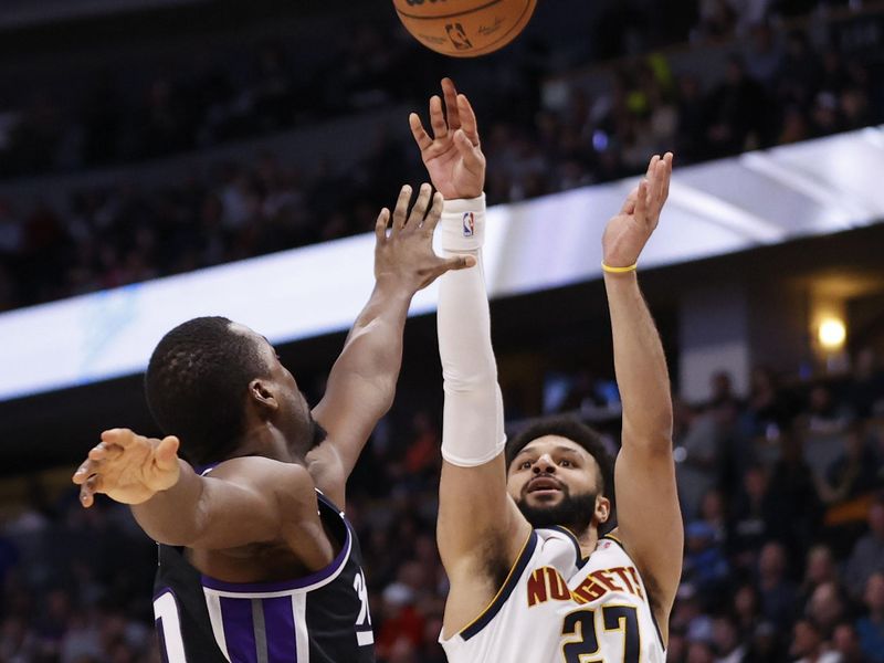 DENVER, COLORADO - FEBRUARY 28: Jamal Murray #27 of the Denver Nuggets shoots against Harrison Barnes #40 of the Sacramento Kings at Ball Arena on February 28, 2024 in Denver, Colorado. NOTE TO USER: User expressly acknowledges and agrees that, by downloading and or using this photograph, User is consenting to the terms and conditions of the Getty Images License Agreement. (Photo by Brendall O'Banon/Clarkson Creative/Getty Images)