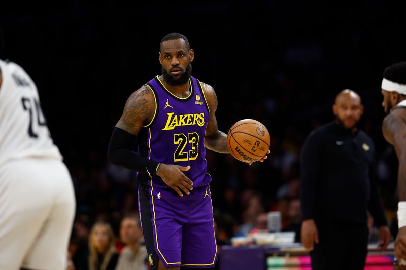 LOS ANGELES, CALIFORNIA - JANUARY 19:  LeBron James #23 of the Los Angeles Lakers in the first half at Crypto.com Arena on January 19, 2024 in Los Angeles, California.  NOTE TO USER: User expressly acknowledges and agrees that, by downloading and/or using this photograph, user is consenting to the terms and conditions of the Getty Images License Agreement.  (Photo by Ronald Martinez/Getty Images)