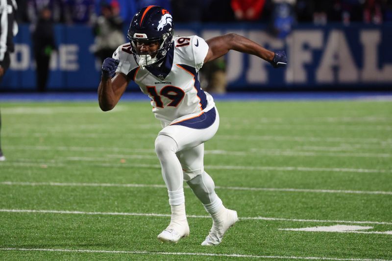 Denver Broncos wide receiver Marvin Mims Jr. (19) runs a route during the second half of an NFL football game against the Buffalo Bills in Orchard Park, N.Y., Monday Nov. 13, 2023. (AP Photo/ Jeffrey T. Barnes)