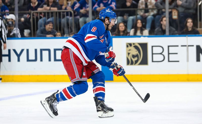 Mar 22, 2025; New York, New York, USA; New York Rangers center J.T. Miller (8) skates against the Vancouver Canucks during the first period at Madison Square Garden. Mandatory Credit: Danny Wild-Imagn Images