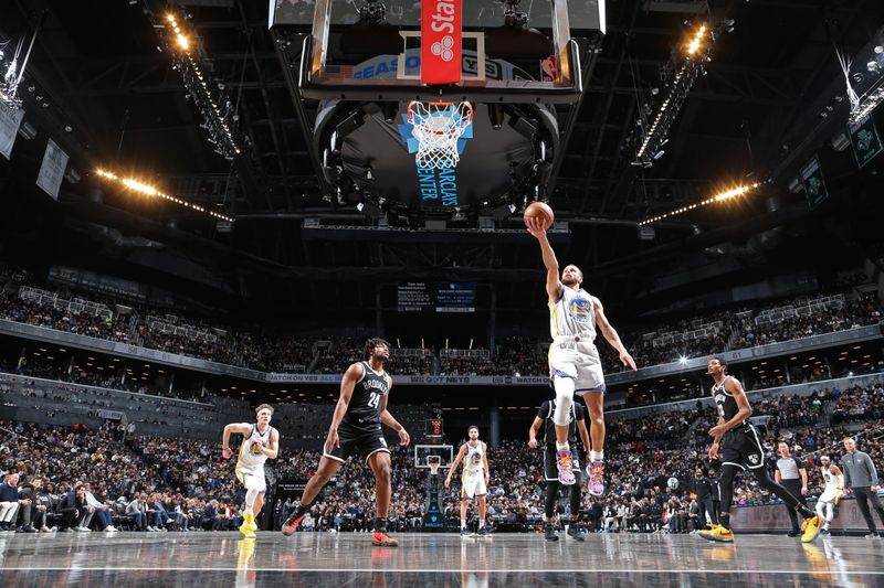 BROOKLYN, NY - FEBRUARY 5: Stephen Curry #30 of the Golden State Warriors shoots the ball during the game against the Brooklyn Nets on February 5, 2024 at Barclays Center in Brooklyn, New York. NOTE TO USER: User expressly acknowledges and agrees that, by downloading and or using this Photograph, user is consenting to the terms and conditions of the Getty Images License Agreement. Mandatory Copyright Notice: Copyright 2024 NBAE (Photo by Nathaniel S. Butler/NBAE via Getty Images)