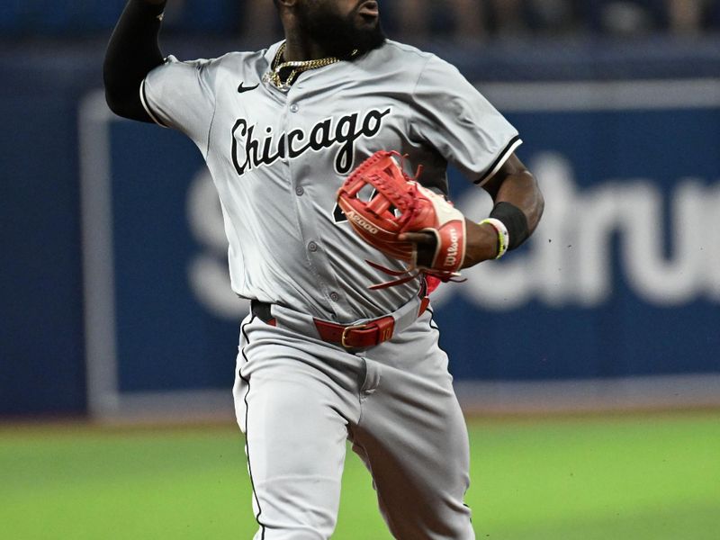 May 7, 2024; St. Petersburg, Florida, USA; Chicago White Sox third baseman Bryan Ramos (44) throws to first base in the seventh inning against the Tampa Bay Rays at Tropicana Field. Mandatory Credit: Jonathan Dyer-USA TODAY Sports