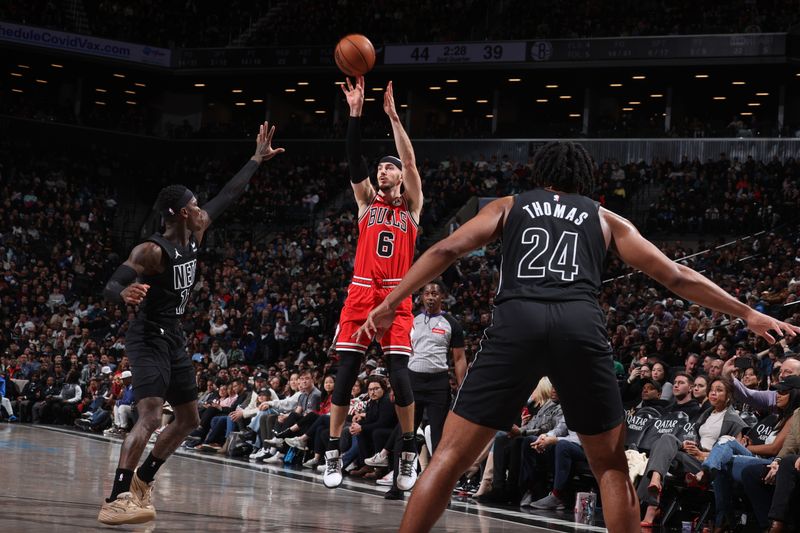 BROOKLYN, NY - MARCH 29: Alex Caruso #6 of the Chicago Bulls shoots the ball during the game against the Brooklyn Nets on March 29, 2024 at Barclays Center in Brooklyn, New York. NOTE TO USER: User expressly acknowledges and agrees that, by downloading and or using this Photograph, user is consenting to the terms and conditions of the Getty Images License Agreement. Mandatory Copyright Notice: Copyright 2024 NBAE (Photo by Nathaniel S. Butler/NBAE via Getty Images)