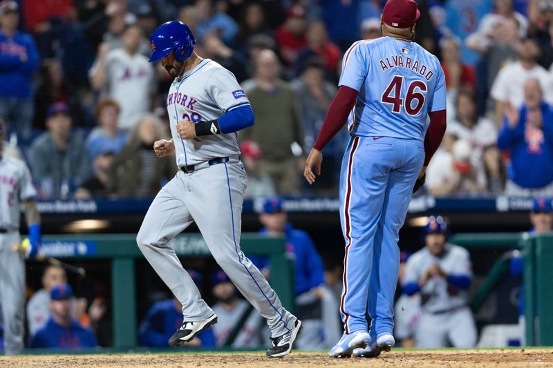 May 16, 2024; Philadelphia, Pennsylvania, USA; New York Mets designated hitter J.D. Martinez (28) scores in front of Philadelphia Phillies pitcher José Alvarado (46) during the eleventh inning at Citizens Bank Park. Mandatory Credit: Bill Streicher-USA TODAY Sports