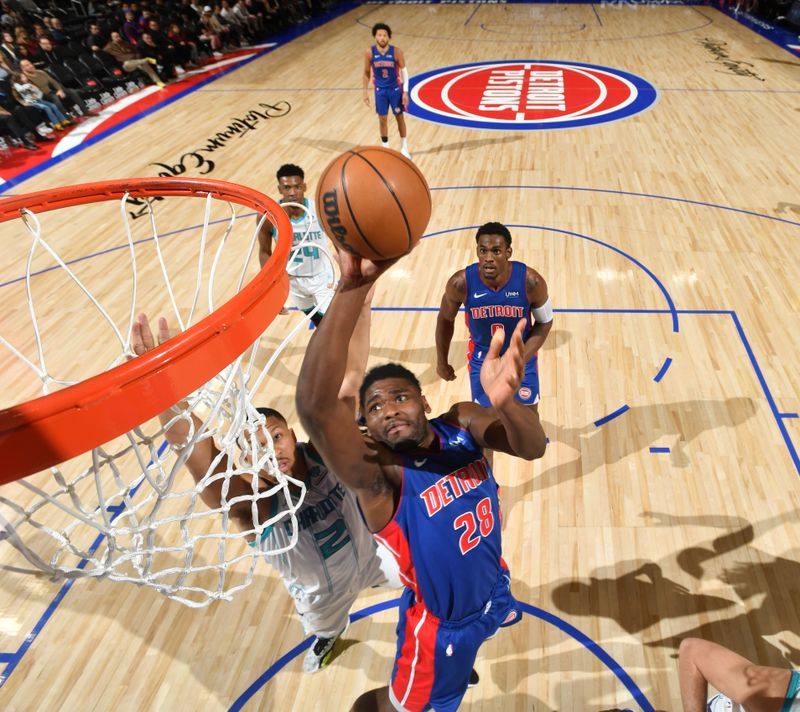 DETROIT, MI - MARCH 11: Isaiah Stewart #28 of the Detroit Pistons drives to the basket during the game against the Charlotte Hornets  on March 11, 2024 at Little Caesars Arena in Detroit, Michigan. NOTE TO USER: User expressly acknowledges and agrees that, by downloading and/or using this photograph, User is consenting to the terms and conditions of the Getty Images License Agreement. Mandatory Copyright Notice: Copyright 2024 NBAE (Photo by Chris Schwegler/NBAE via Getty Images)