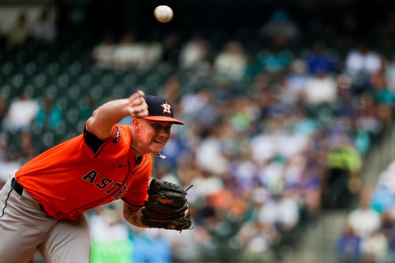 Jul 20, 2025; Seattle, Washington, USA; Houston Astros starting pitcher Hunter Brown (58) throws against the Seattle Mariners during the second inning at T-Mobile Park. Mandatory Credit: Joe Nicholson-Imagn Images