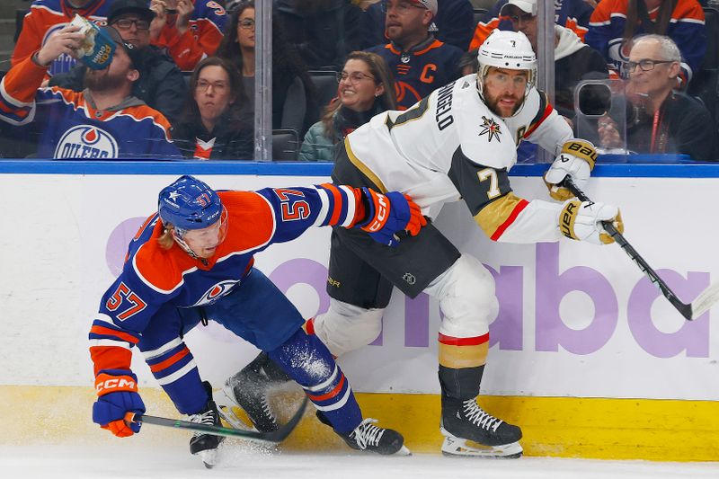 Nov 28, 2023; Edmonton, Alberta, CAN; Edmonton Oilers forward James Hamblin (57)  and Vegas Golden Knights defensemen Alex Pietrangelo (7) battle for a loose puck during the first period at Rogers Place. Mandatory Credit: Perry Nelson-USA TODAY Sports