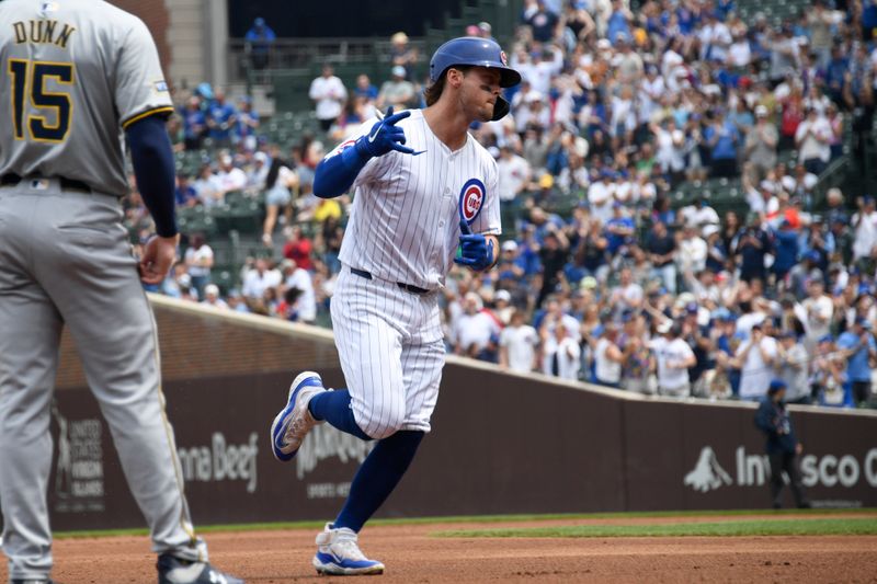 May 4, 2024; Chicago, Illinois, USA;   Chicago Cubs second base Nico Hoerner (2) rounds the bases after hitting a home run against the Milwaukee Brewers during the first inning at Wrigley Field. Mandatory Credit: Matt Marton-USA TODAY Sports