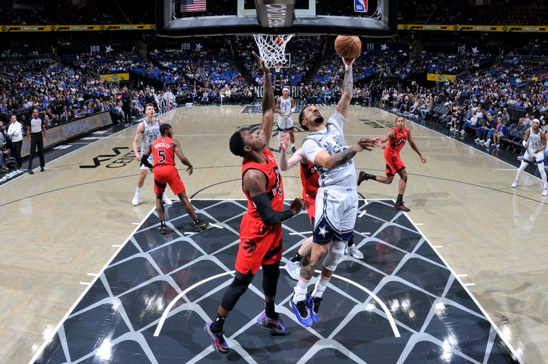 ORLANDO, FL - MARCH 2: Cole Anthony #50 of the Orlando Magic shoots the ball during the game against the Toronto Raptors on March 2, 2025 at Kia Center in Orlando, Florida. NOTE TO USER: User expressly acknowledges and agrees that, by downloading and or using this photograph, User is consenting to the terms and conditions of the Getty Images License Agreement. Mandatory Copyright Notice: Copyright 2025 NBAE (Photo by Fernando Medina/NBAE via Getty Images)