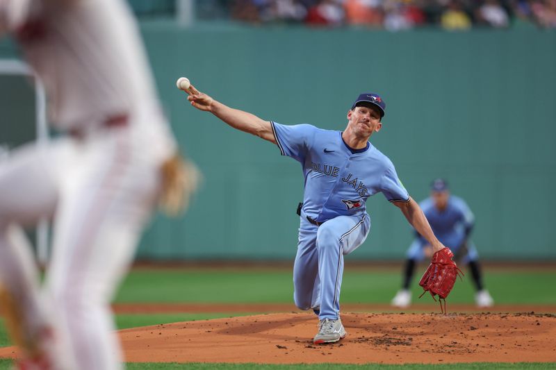 Aug 28, 2024; Boston, Massachusetts, USA; Toronto Blue Jays starting pitcher Chris Bassitt (40) throws a pitch during the first inning against the Boston Red Sox at Fenway Park. Mandatory Credit: Paul Rutherford-USA TODAY Sports