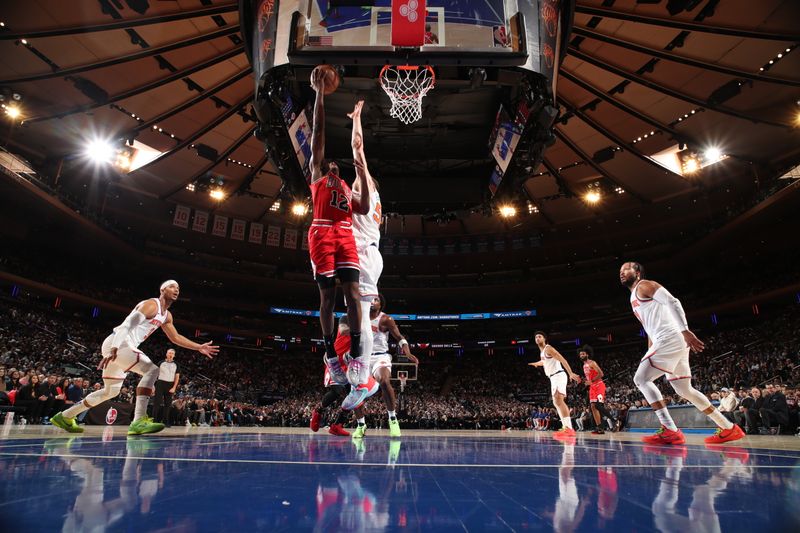 NEW YORK, NY - JANUARY 3: Ayo Dosunmu #12 of the Chicago Bulls drives to the basket during the game against the New York Knicks on January 3, 2024 at Madison Square Garden in New York City, New York.  NOTE TO USER: User expressly acknowledges and agrees that, by downloading and or using this photograph, User is consenting to the terms and conditions of the Getty Images License Agreement. Mandatory Copyright Notice: Copyright 2024 NBAE  (Photo by Nathaniel S. Butler/NBAE via Getty Images)