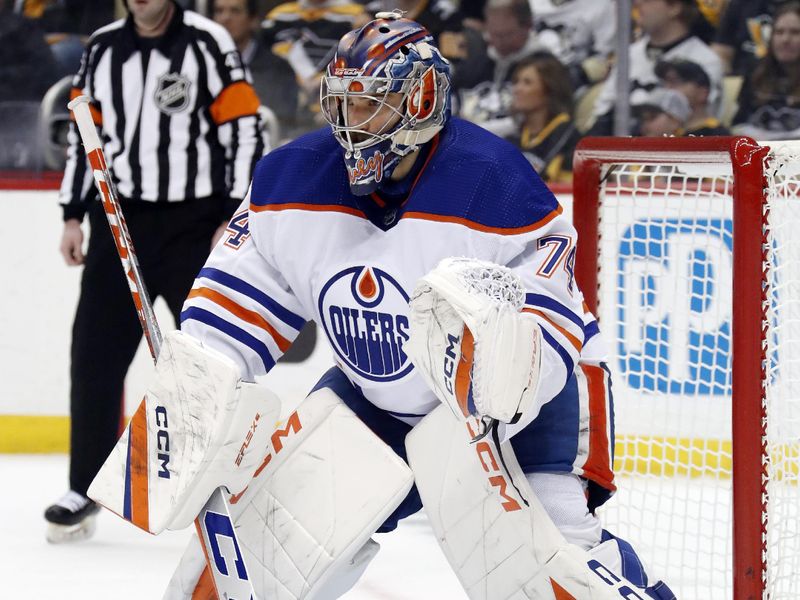 Feb 23, 2023; Pittsburgh, Pennsylvania, USA;  Edmonton Oilers goaltender Stuart Skinner (74) guards the net against the Pittsburgh Penguins during the first period at PPG Paints Arena. Edmonton won 7-2. Mandatory Credit: Charles LeClaire-USA TODAY Sports